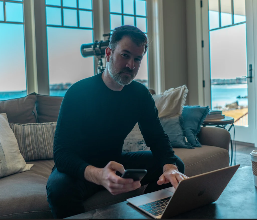 Jeff sitting at his computer