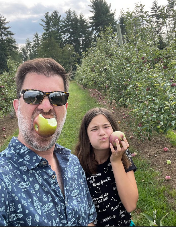 jef and his daughter while apple picking