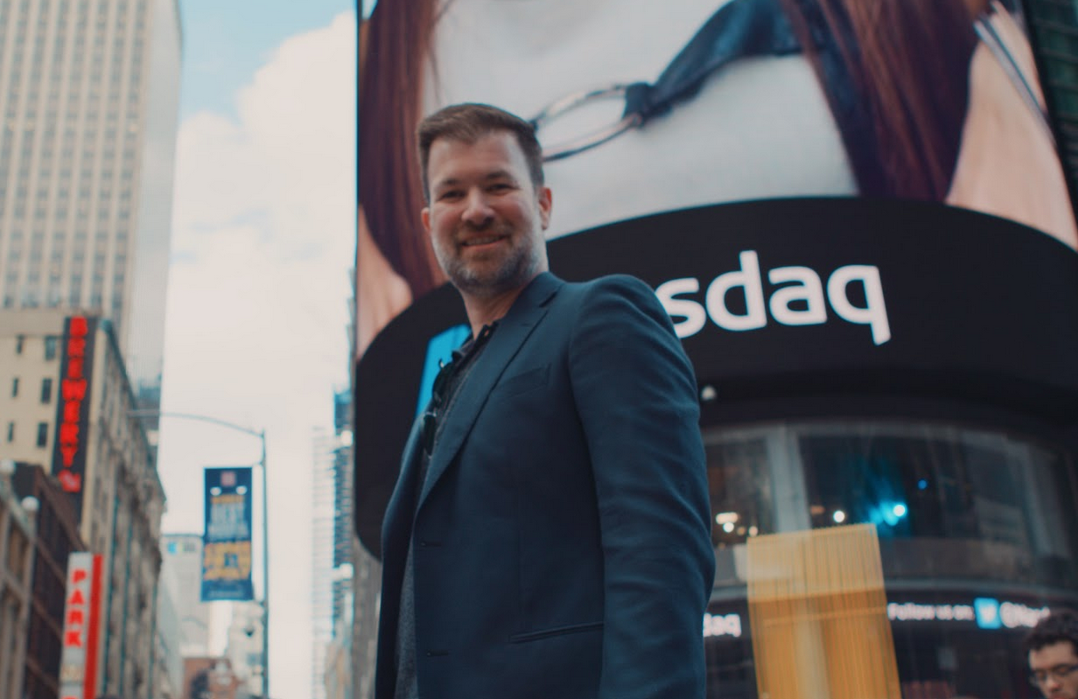JEFF IN FRONT OF THE NASDAQ